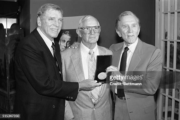 Veteran producer Walter Seltzer was presented a Silver Medallion Award of Honor, the Motion Picture and Television Fund's Kirk Douglas and Burt...