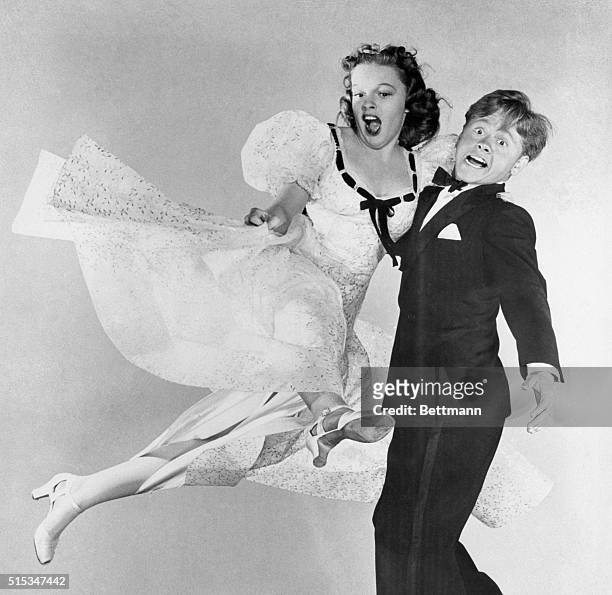 Judy Garland and Mickey Rooney in action during a scene from ‘Strike Up the Band,' gave first prize in the action still class of the Hollywood...