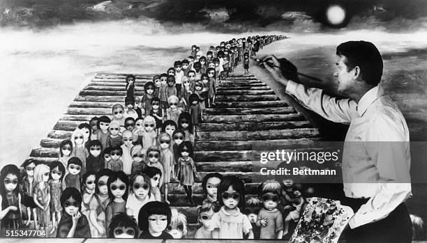 American plagiarist Walter Keane posing with the painting, 'Tomorrow Forever', circa 1964. The painting was to be have been exhibited at the 1964 New...