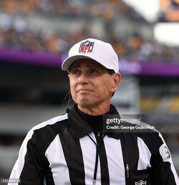 National Football League referee Tony Corrente looks on from the field during a game between the Cincinnati Bengals and Pittsburgh Steelers at Heinz...