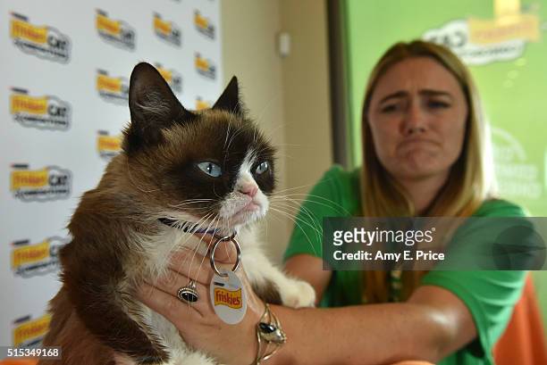 Grumpy Cat and Tabitha Bundesen during Grumpy Cat's appearance during SXSW on March 13, 2016 in Austin, Texas.