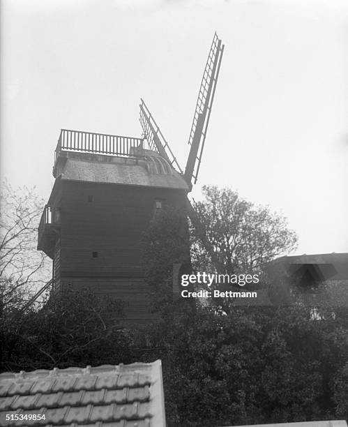 The old Moulin de la Gallett in Montmartre, France's last authentic windmill. Instead of grinding out bread for Paris it now grounds out jazz music...