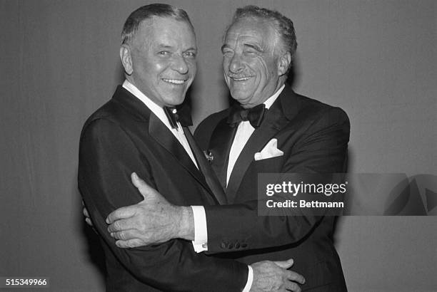 Frank Sinatra embraces pianist-comedian, Victor Borge prior to their concert benefitting Memorial Sloan-Kettering Cancer Center at Radio City Music...