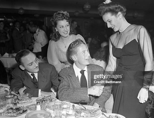 California State Guard Military Ball, held at the Palladium, Hollywood, California. Maureen O'Hara , and Fay McKenzie, greet Ken Sanger who was radio...