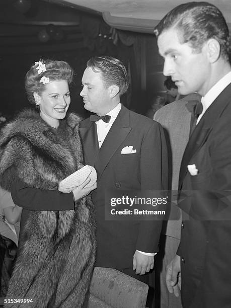 California State Guard Military Ball, held at the Palladium, Hollywood, California. Maureen O'Hara, and her husband William Price Jr. Leave the ball.