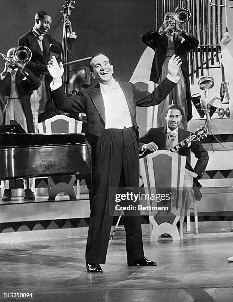 Al Jolson singing with band. Undated Photograph.