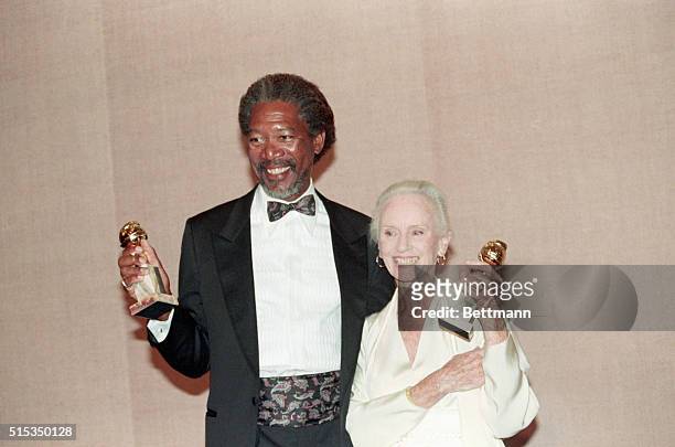 Beverly Hills, CA-Morgan Freeman and Jessica Tandy pose with Golden Globe Awards for their co-starring roles in the film "Driving Miss Daisy."...