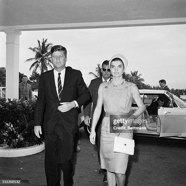 West Palm Beach, FL: President and Mrs. Kennedy are shown returning to St. Mary's Hospital late 12/20 where they spent most of the day 12/20 at the...