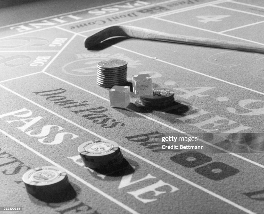 Chips & Dice on a Gambling Table