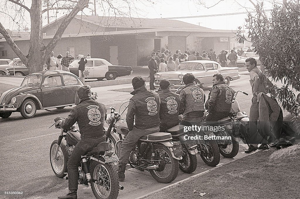Roaming Saints on Parked Motorcycles