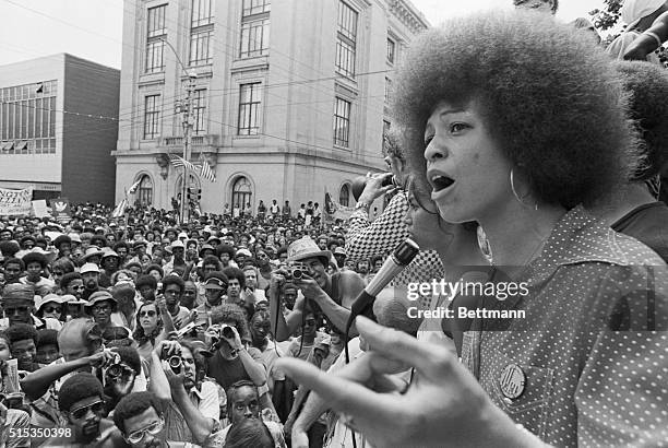 Radical political activist Angela Davis speaks at a street rally in Raleigh, North Carolina, 4th July 1974.