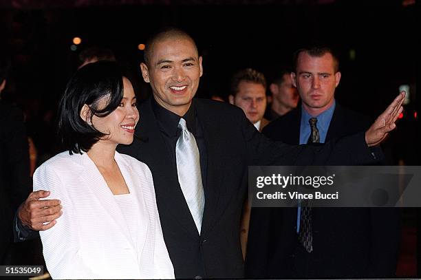 Hong Kong actor Chow Yun-Fat arrives with his wife Jasmine for the world premiere of his new film "Anna and the King" 15 December 1999 in Hollywood,...