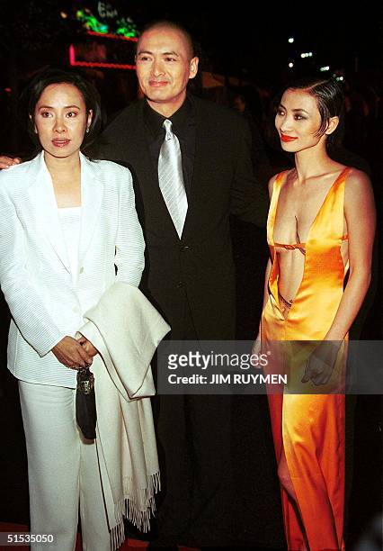 Hong Kong actor Chow Yun-Fat arrives with his wife Jasmine and Chinese actress Bai Ling for the world premiere of their new film "Anna and the King"...