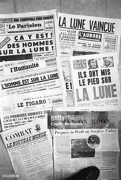 The moon landing headlines on various newspapers including the International Herald Tribune, l'Humanite and Le Figaro.