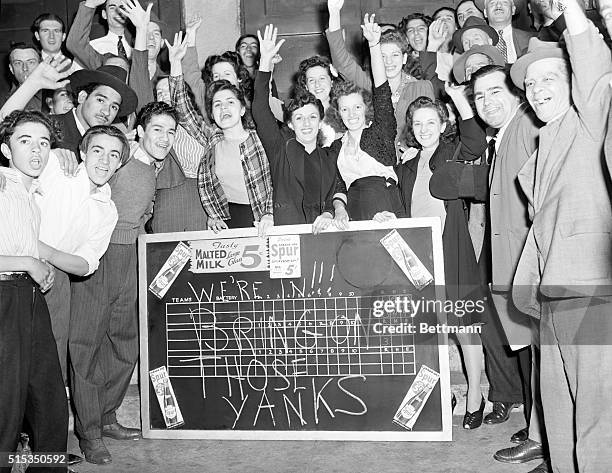 New York, NY: Flushed with triumph and filled with confidence in their idols, the Brooklyn Dodgers, after learning from a scoreboard on a candy store...