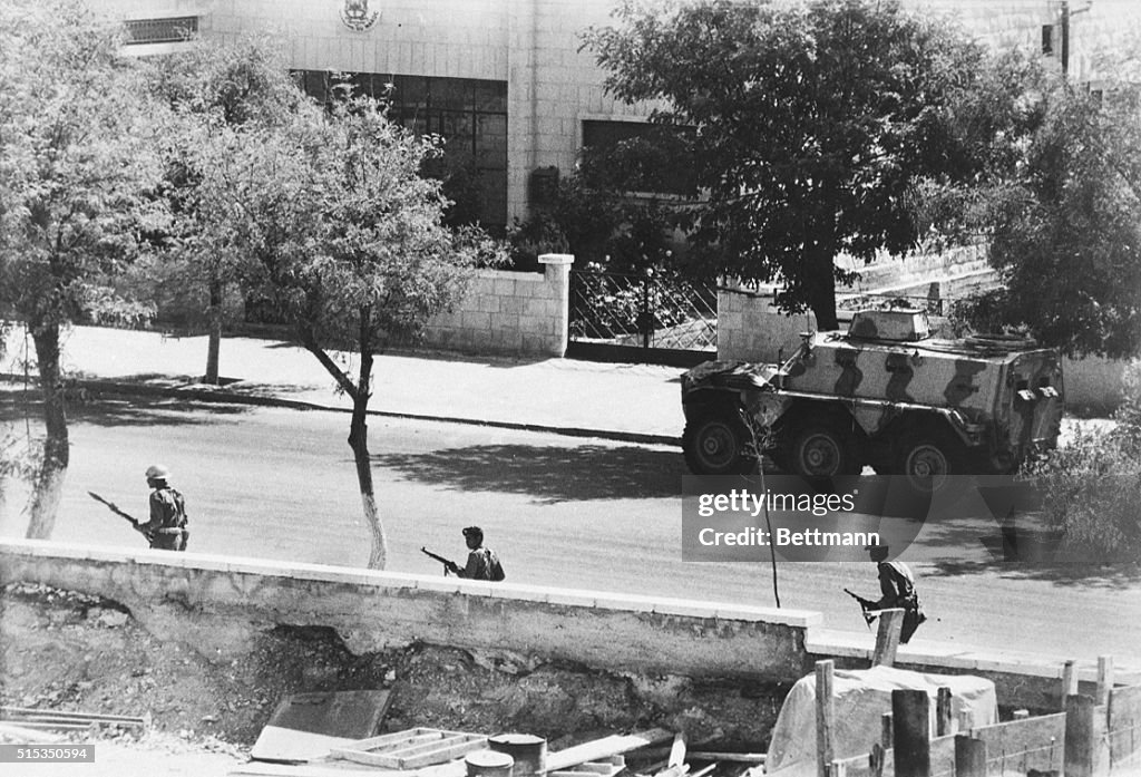 Armed Soldier and Tank on the Street