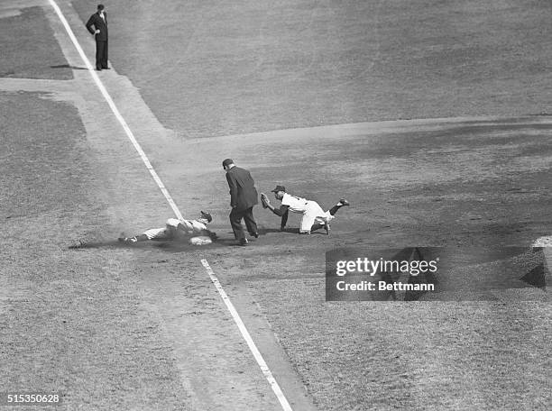 Polo Grounds, New York, NY: Vic Wertz of the Cleveland Indians slides safely into third in the first inning of the World Series opener against the...