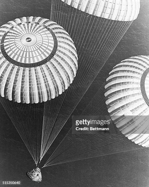 The Apollo 17 spacecraft containing astronauts Eugene A. Cernan, Ronald E. Evans, and Harrison H. Schmitt glided to a safe splashdown at 2:25 p.m....