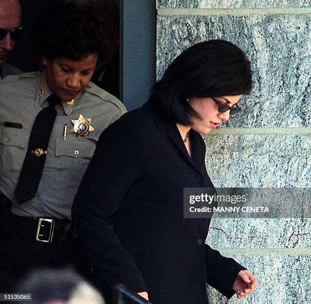 Monica Lewinsky leaves the Howard County Courthouse in Ellicott City, MD 16 December, 1999 after testifying in the Linda Tripp wire tapping trial....