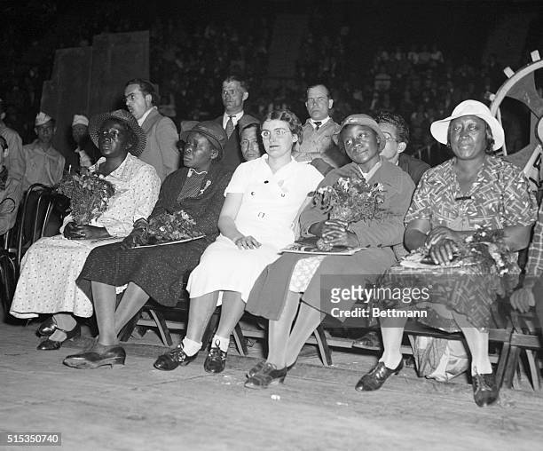 New York, NY: Ruby Bates, one of the principal witnesses in the famous Scottsboro Case , seated with the mothers of four of the accused Scottsboro...