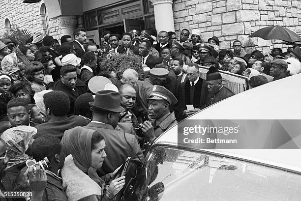 Los Angeles, CA- The casket containing the body of singer Sam Cooke is barely visible in the crowd of people on hand at Mount Sinai Baptist Church to...