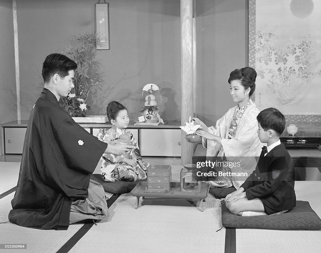 Family Celebrating New Year In Japan