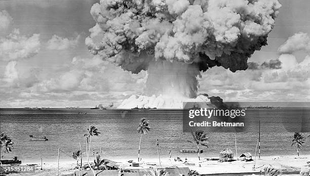 View of "Baker" atomic bomb explosion at Bikini Atoll on July 25, 1946 -- the last of three American tests. The blast sent up a column of water 5000...