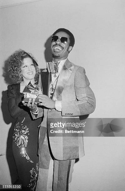 New York, NY- Bette Midler looks on after presenting Stevie Wonder with a Grammy for Best Album of the Year at the 17th annual National Academy of...