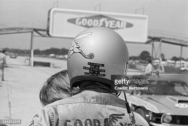 Sebring, FL- Quick, fans, what's Paul Newman's blood type? Can you tell It's O positive, from the data on the back of his helmet as he stands on the...