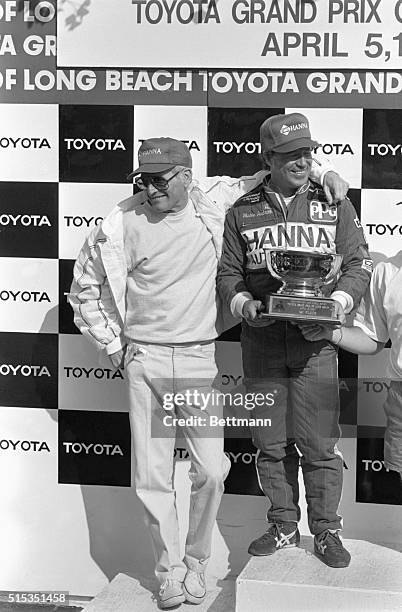 Paul Newman congratulates Mario Andretti after Andretti lead wire to wire to win the Long Beach Grand Prix 4/5. Andretti won his 19th Indy Car race,...