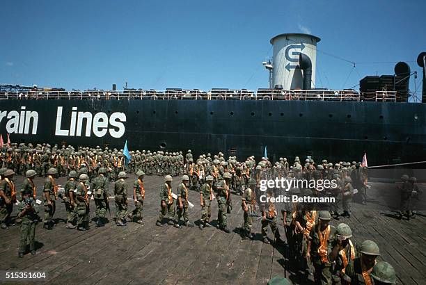 Da Nang, South Vietnam- Troops of the First Battalion, Ninth Marine Regiment, hold ceremonies, then board the USS Paul Revere here, July 14th, as...