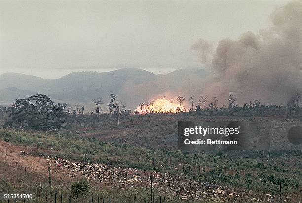 Khe Sahn, Vietnam- Napalm bombs and 250-pound snake eye bombs are shown as they go off in support of a pinned down Marine platoon that's been on...