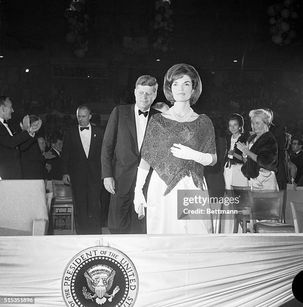 Washington, DC- President and Mrs. Kennedy are shown as they film a nationwide closed circuit television show, "An American Pageant of the Arts," to...