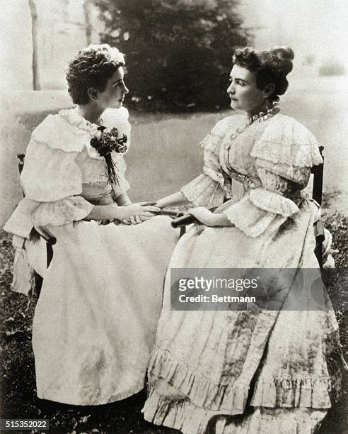 Helen Keller , deaf and blind since age six, communicates by touch with her teacher Anne Sullivan.