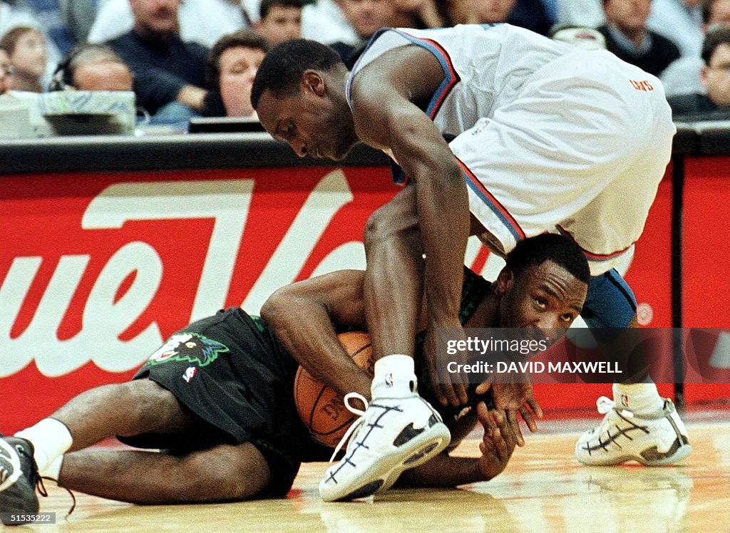 Cleveland Cavaliers guard Brevin Knight (standing)