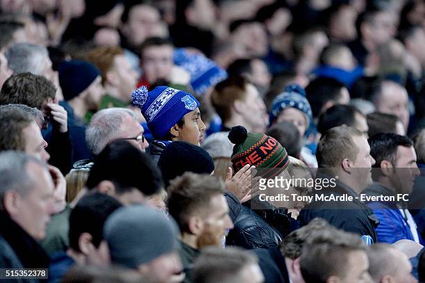 Young Everton fan's head pops up above the crowd during The Emirates FA Cup Sixth Round match between Everton and Chelsea at Goodison Park on March...