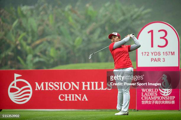 Saraporn Chamchoi of Thailand tees off at the 13th hole during Round 4 of the World Ladies Championship 2016 on 13 March 2016 at Mission Hills...