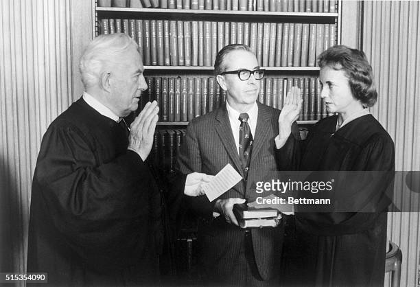 Washington, D.C.- Sandra Day O'Connor is sworn-in as a Supreme Court Justice by Chief Justice Warren Burger in the court's conference room. At...