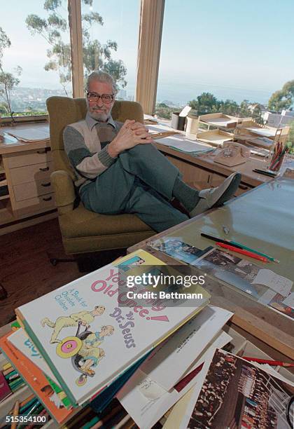 La Jolla, CA- Sitting in his office with his most recent book, "You're Only Old Once!... A Book For Obsolete Children," is Dr. Seuss, famous author...