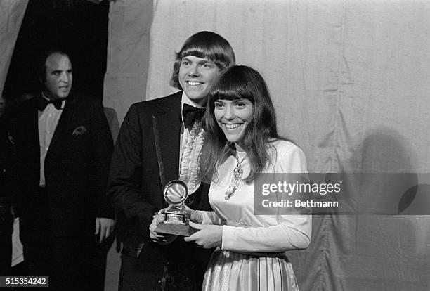 Hollywood, CA- "The Carpenters" Richard and Karen, pose with their Grammy Award for "Best Contemporary duo and Best New Artist of the Year".