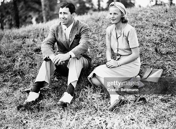 Pinehurst, NC- Mrs. Dick Metz of Chicago, recent bride of the stellar pro golfer, watches her husband play in the North and South Open Golf...