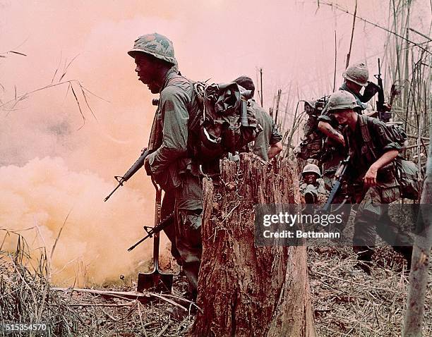 Dak To, Vietnam- Operation MacArthur: Members of Company B, 1st Bn, 173rd Abn Bde, reach the top of one of the many hills in the highlands of Dak To,...