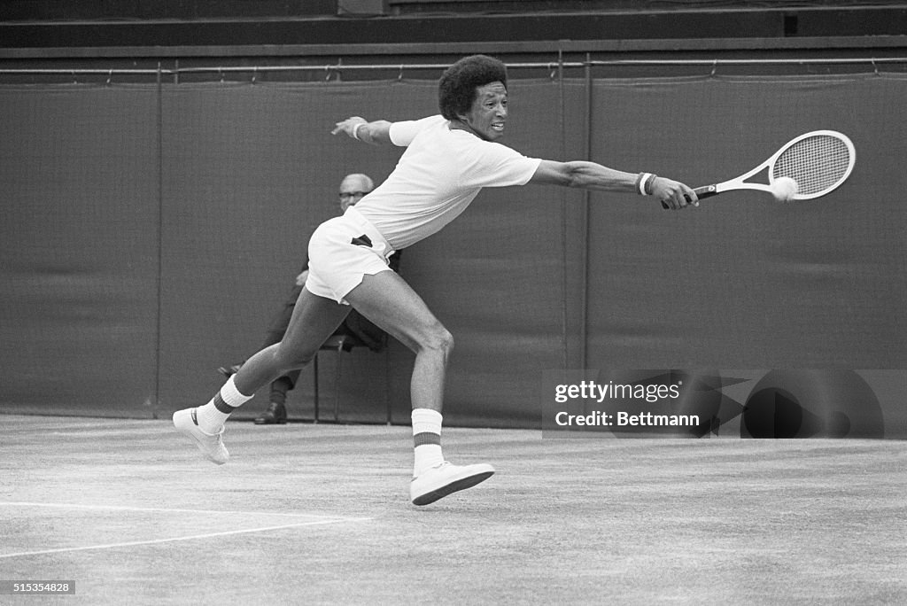 Arthur Ashe Hitting Backhand Shot at Wimbledon