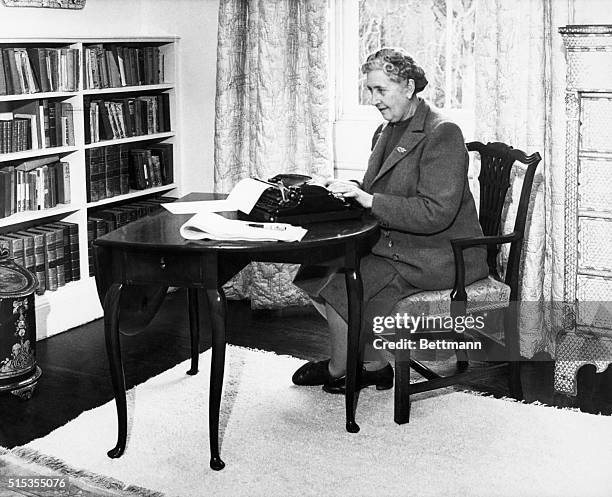 English detective novelist, Agatha Christie typing at her home, Greenway House, Devon, January 1946.