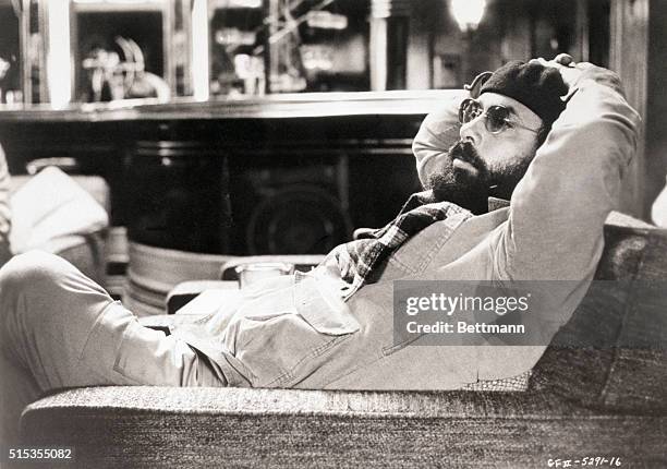 Director Francis Ford Coppola relaxes on the set of "The Godfather," 1974.