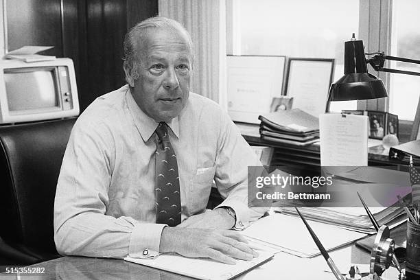 United States Secretary of State George Shultz at his desk in the State Department Building in Washington, DC in 1983.