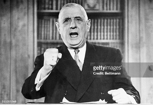 French President Charles de Gaulle gestures during the tape recording of his speech to the French people. The speech marks de Gaulle's appeal for...