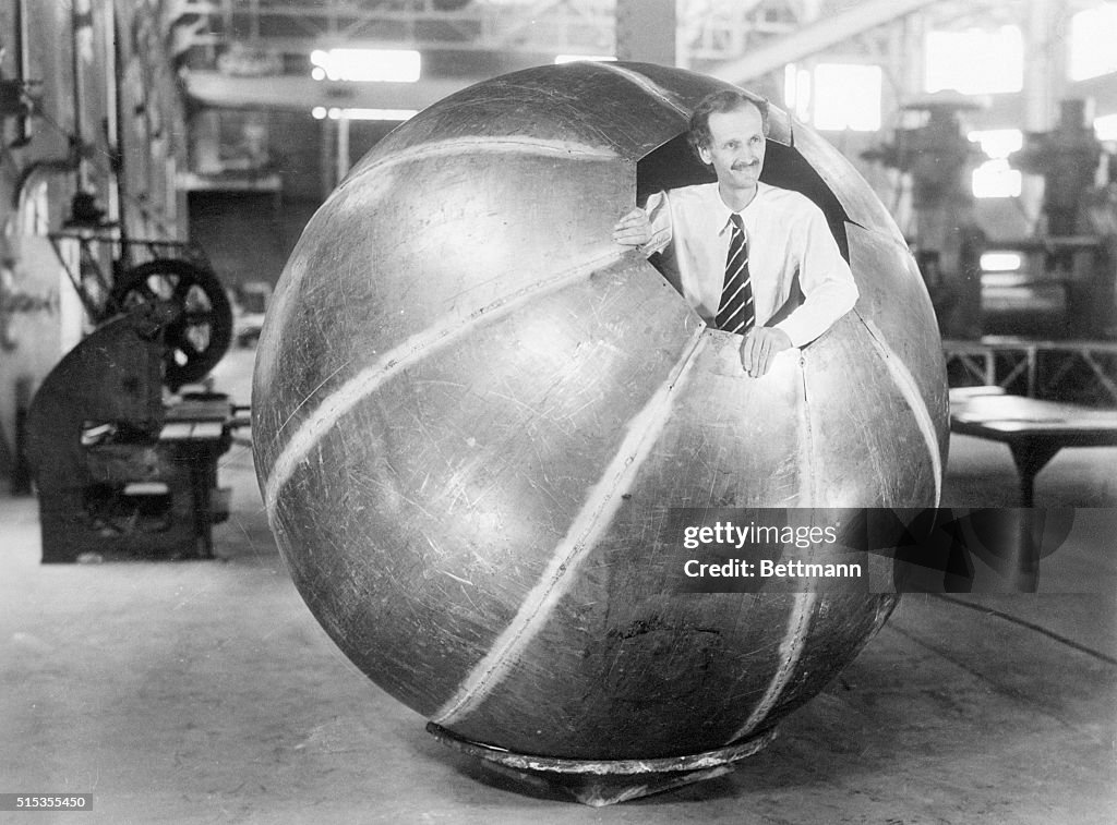 Jean Piccard Stands in Metal Gondola