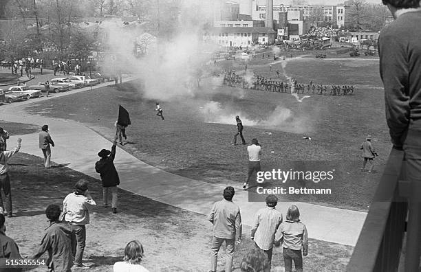 Kent, OH- Picture shows an aerial view of police firing tear gas on student protesters on the Kent State University.