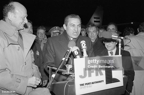 New York, New York- Egyptian President, Hosni Mubarak, speaks to the press upon arrival at JFK as NYC Mayor, Ed Koch, looks on.